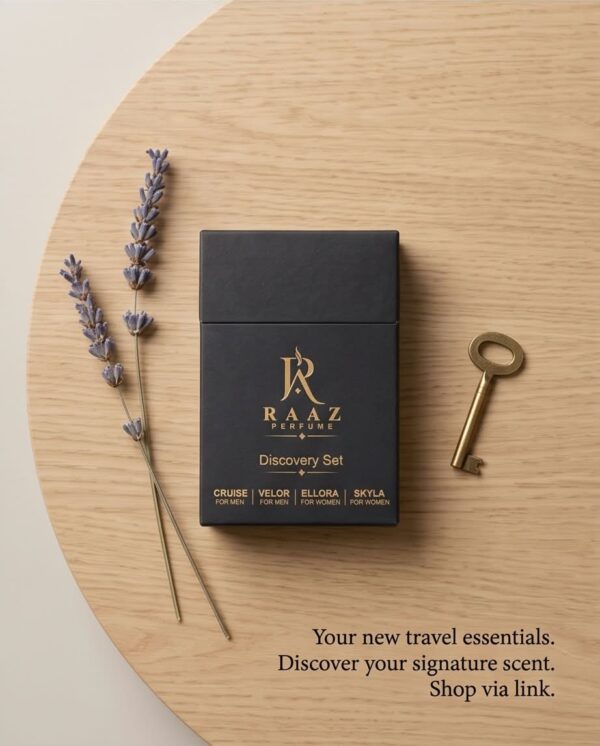 RAAZ Perfume Discovery Set on a wooden tray with lavender and a vintage key
